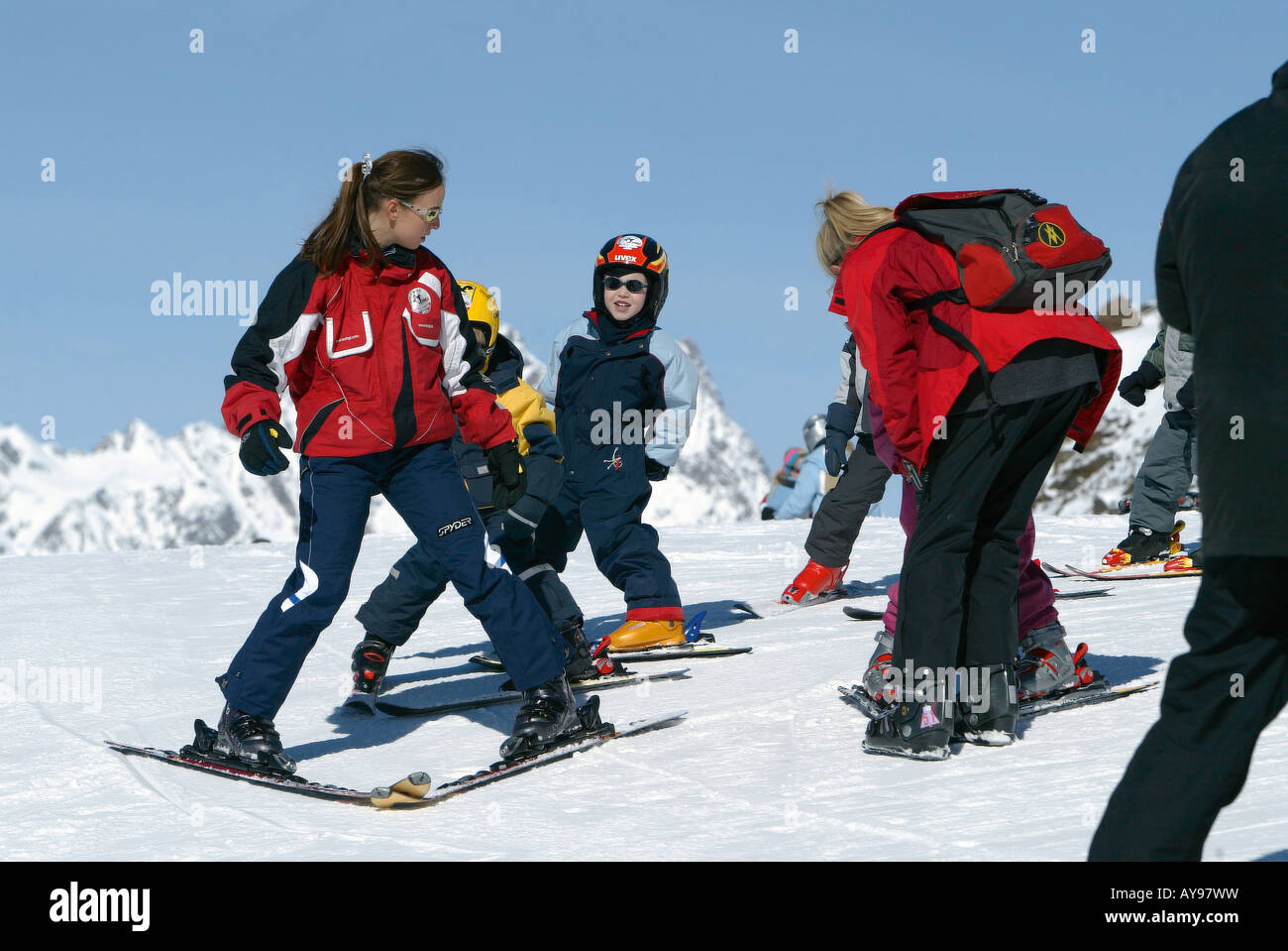 CHILDREN HAVING A SKI LESSON WITH INSTRUCTOR, AUSTRIA Stock Photo ...