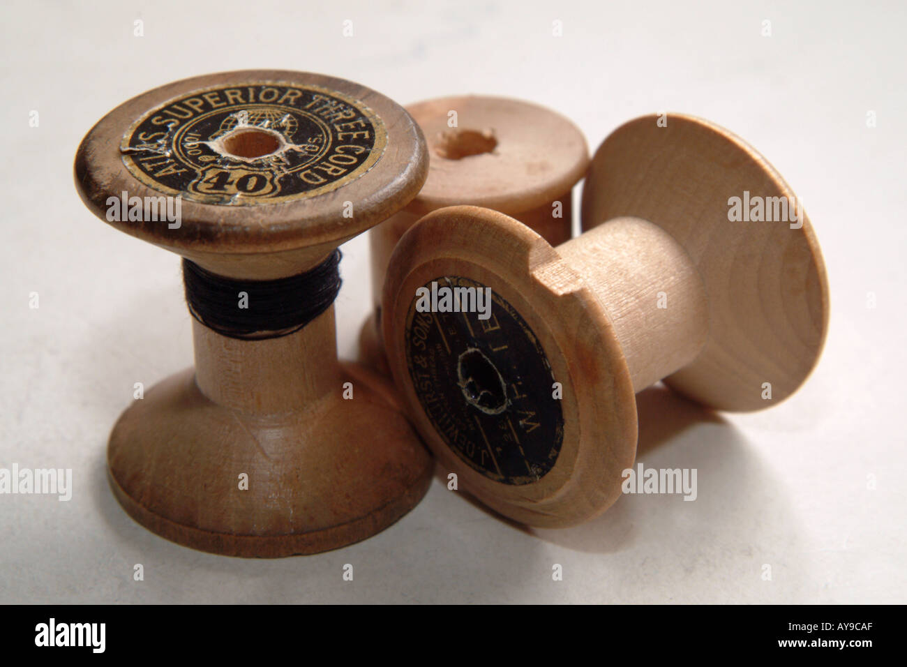 old wooden cotton reels Stock Photo Alamy