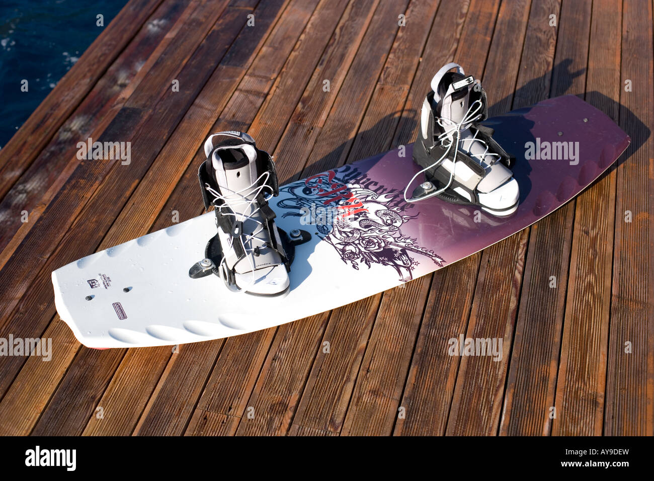 Wakeboard and boots on poolside decking, Turkey Stock Photo Alamy