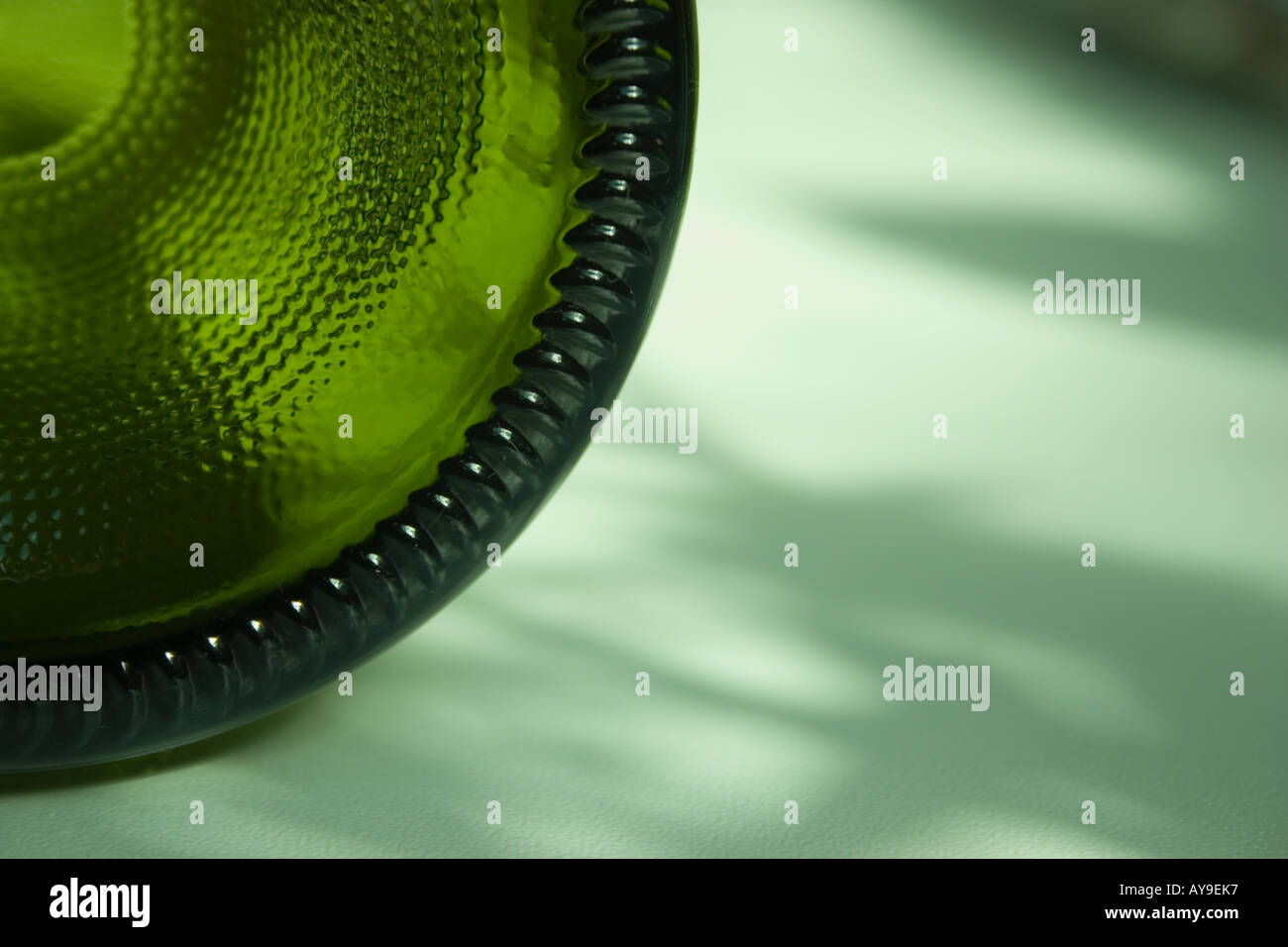 close up of the bottom of a green wine bottle Stock Photo