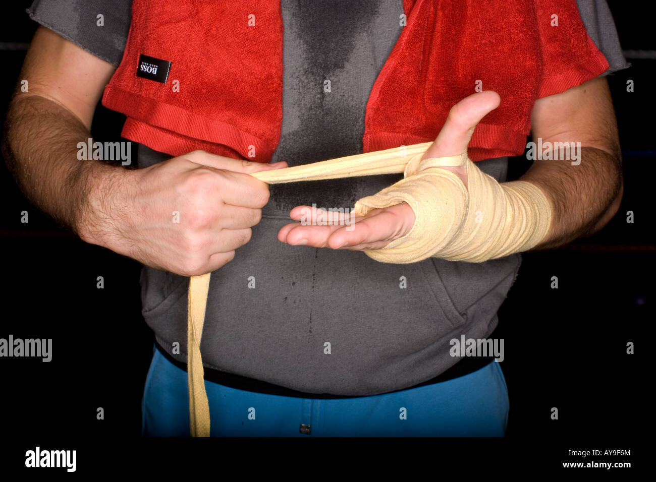 Boxer taping hands in preparation Stock Photo Alamy