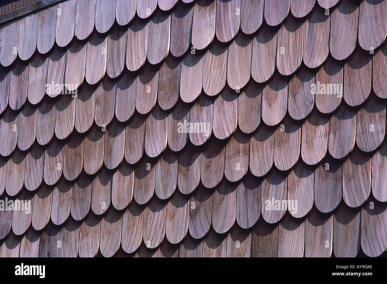 Closeup of wood paneled on a building make an architectural pattern in ...