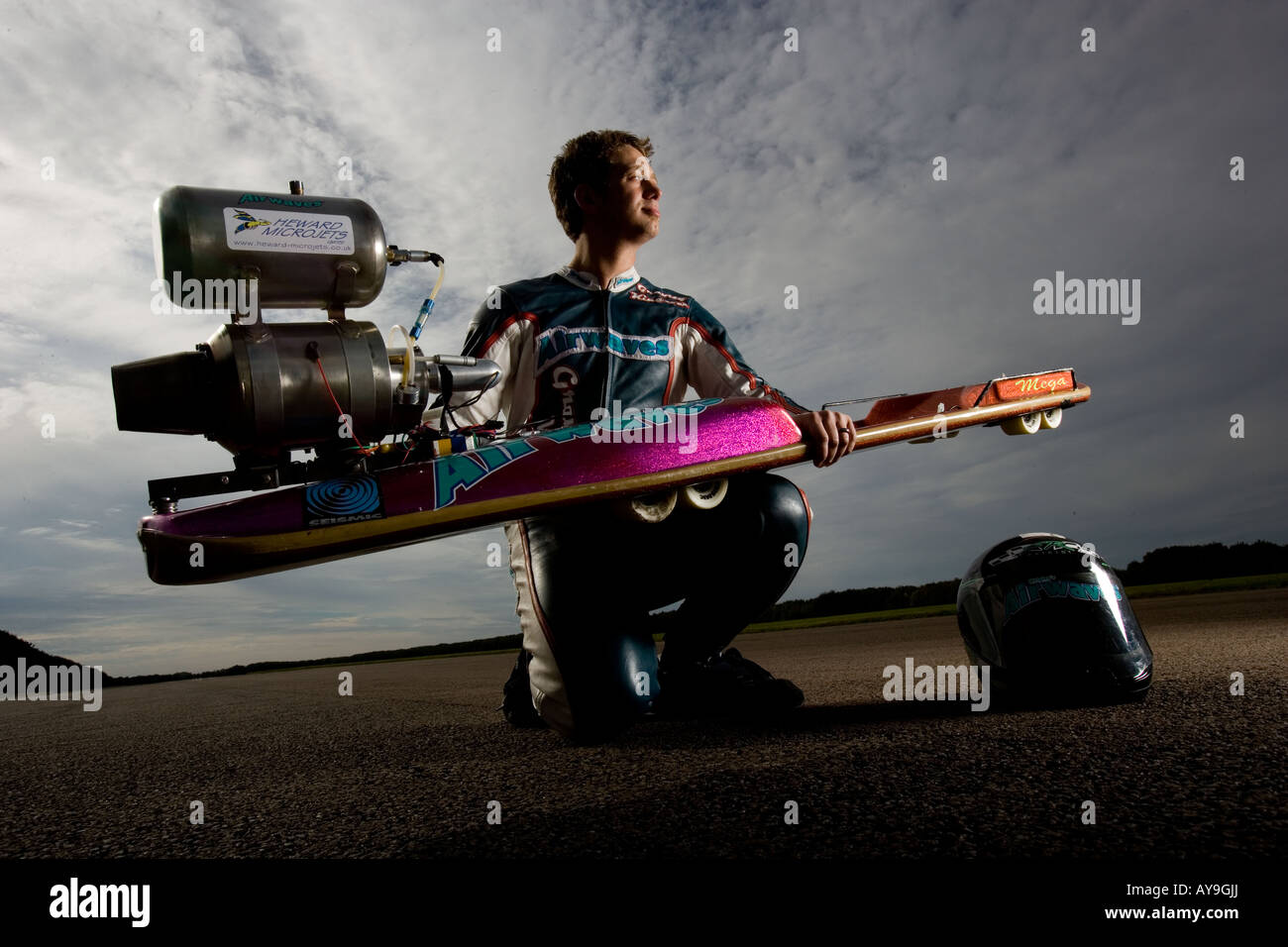 Joel King kneeling with a jet powered street luge Stock Photo