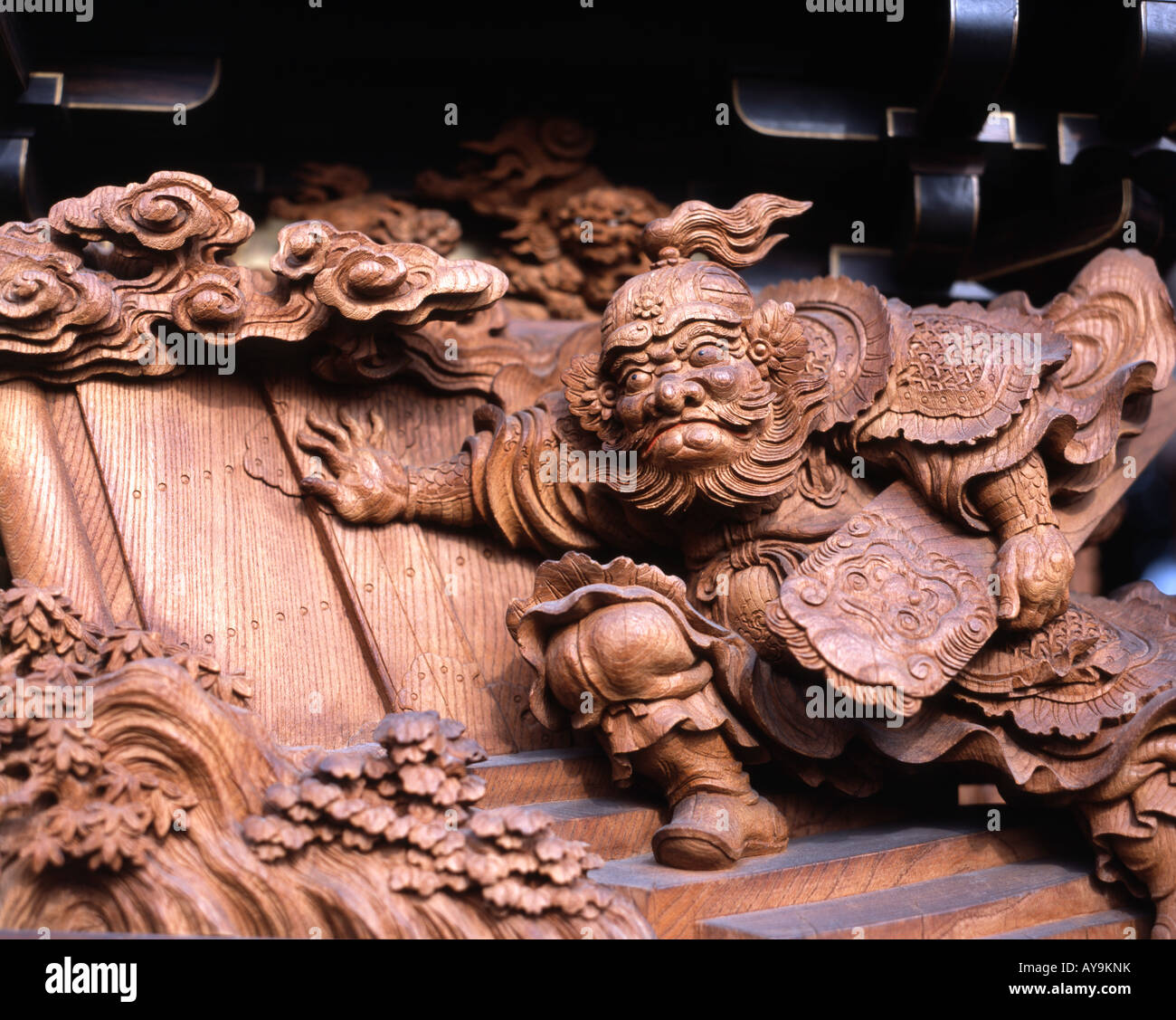 Wooden carving on side of dashi portable shrine, Okkawa Festival near Nagoya Stock Photo