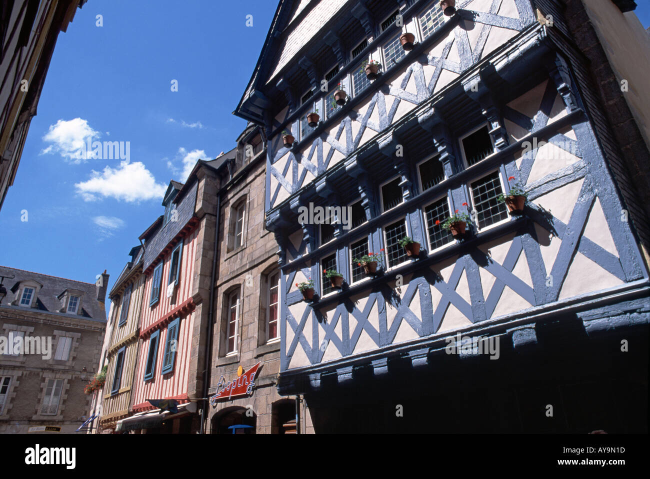 Medieval buildings in one of the shopping streets of Old Quimper, Brittany, France Stock Photo