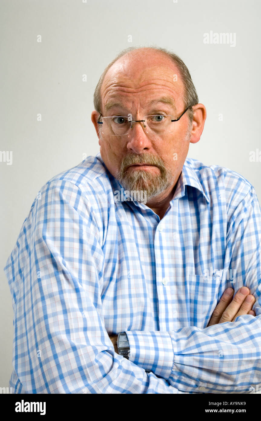 60 year old white man with a a goatee beard and a facial expression ...