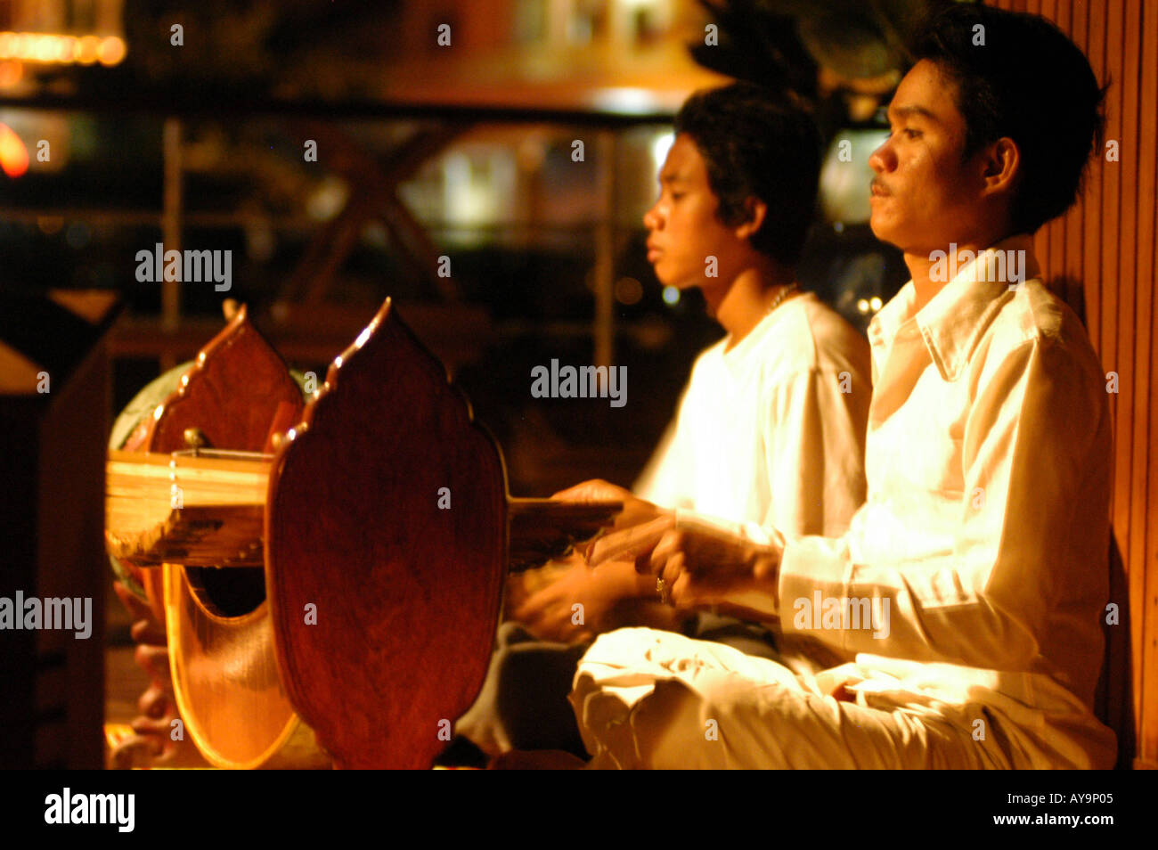 Folk Musicians playing a roneat Cambodia Stock Photo