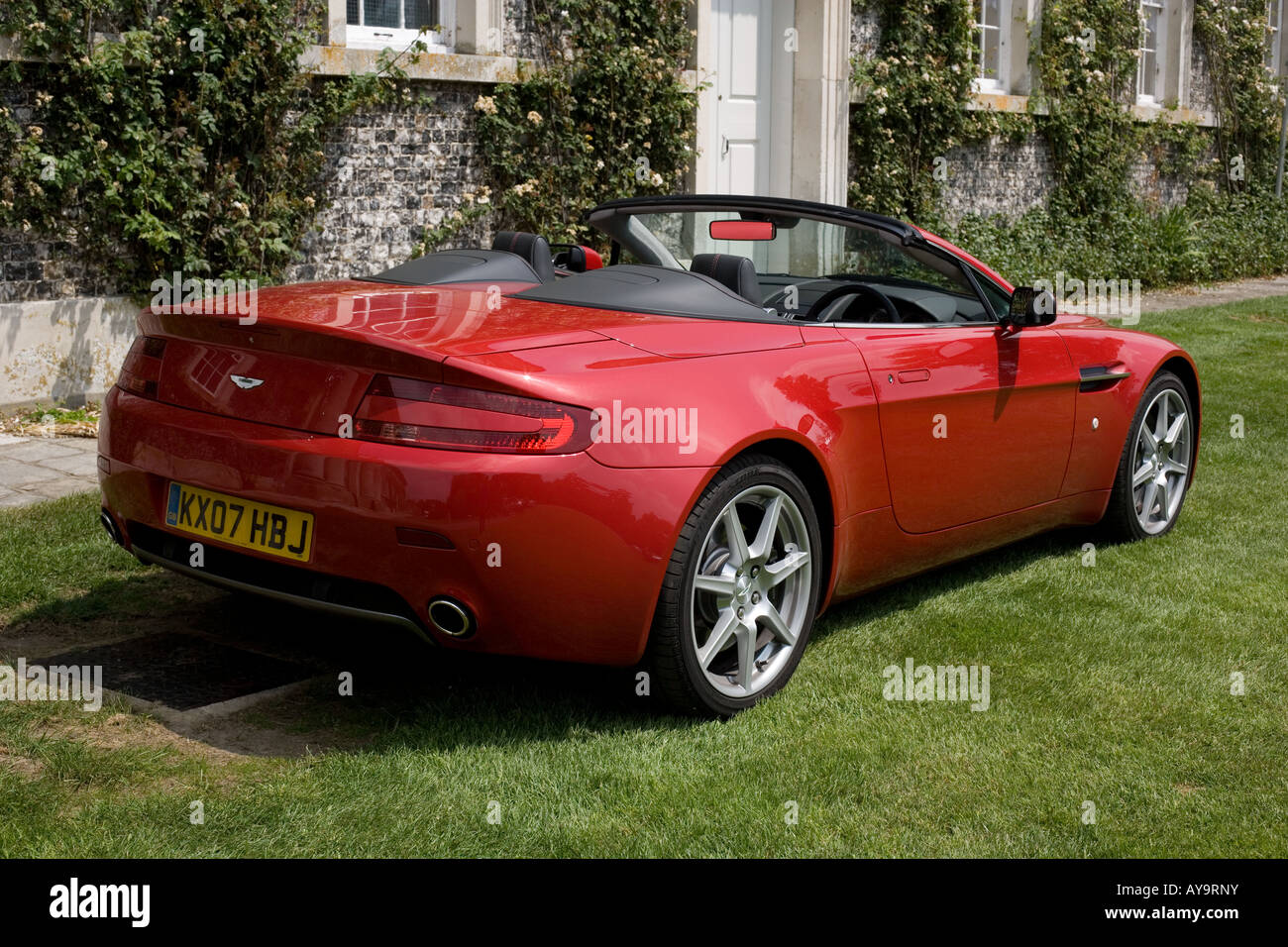 Aston martin v8 vantage roadster red photography and images - Alamy