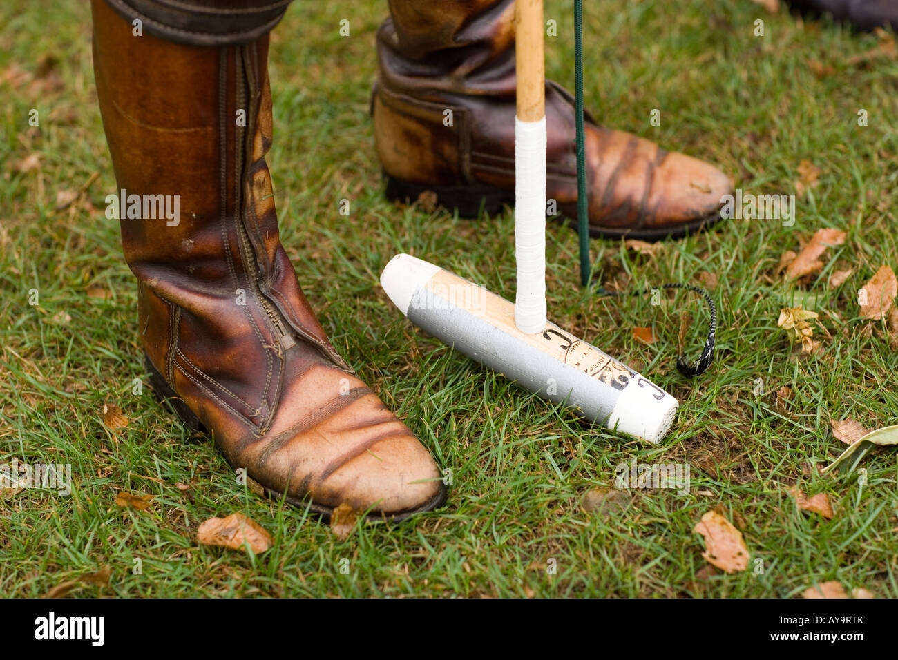 Polo mallet and feet Stock Photo