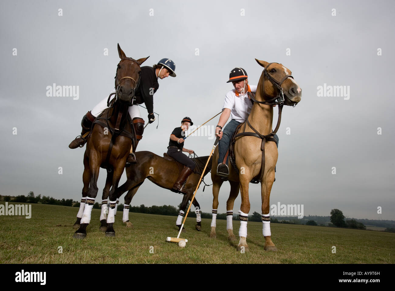 Polo players on horseback Stock Photo