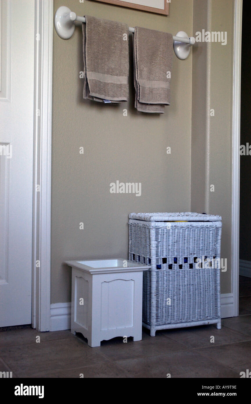 bathroom towels and hamper Stock Photo Alamy