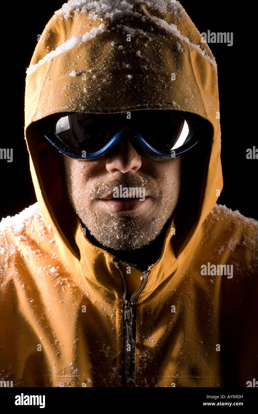 Man modelling skiwear in artificial snow Stock Photo Alamy