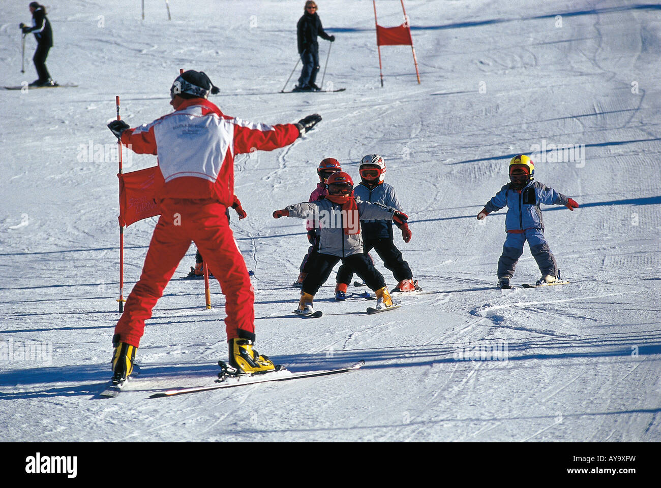 Childrens skiing lesson in Sud Tirol ski resort, Italy Stock Photo