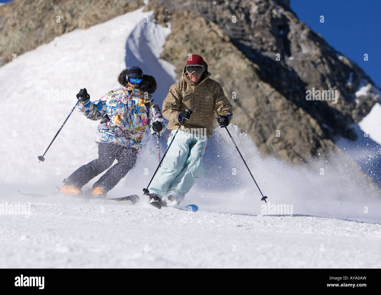 Two skiers dangerously close on slopes in Tignes, France Stock Photo