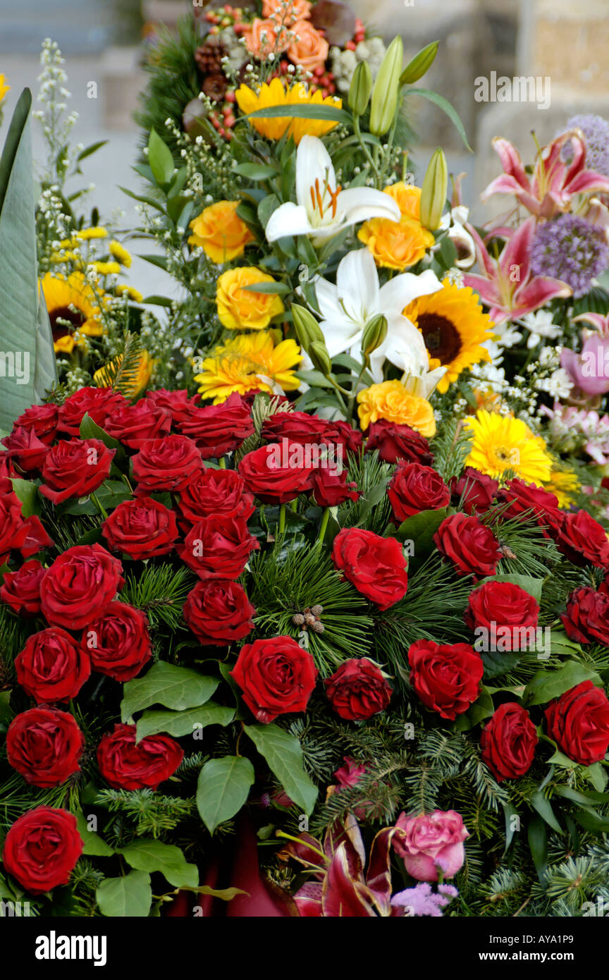 Funeral New Grave Flower Decoration At A Burial Stock Photo