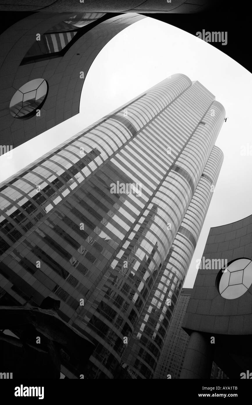 Asia Peoples Republic of China Hong Kong View looking up at curved steel and glass exterior of buildings at One and Two Stock Photo