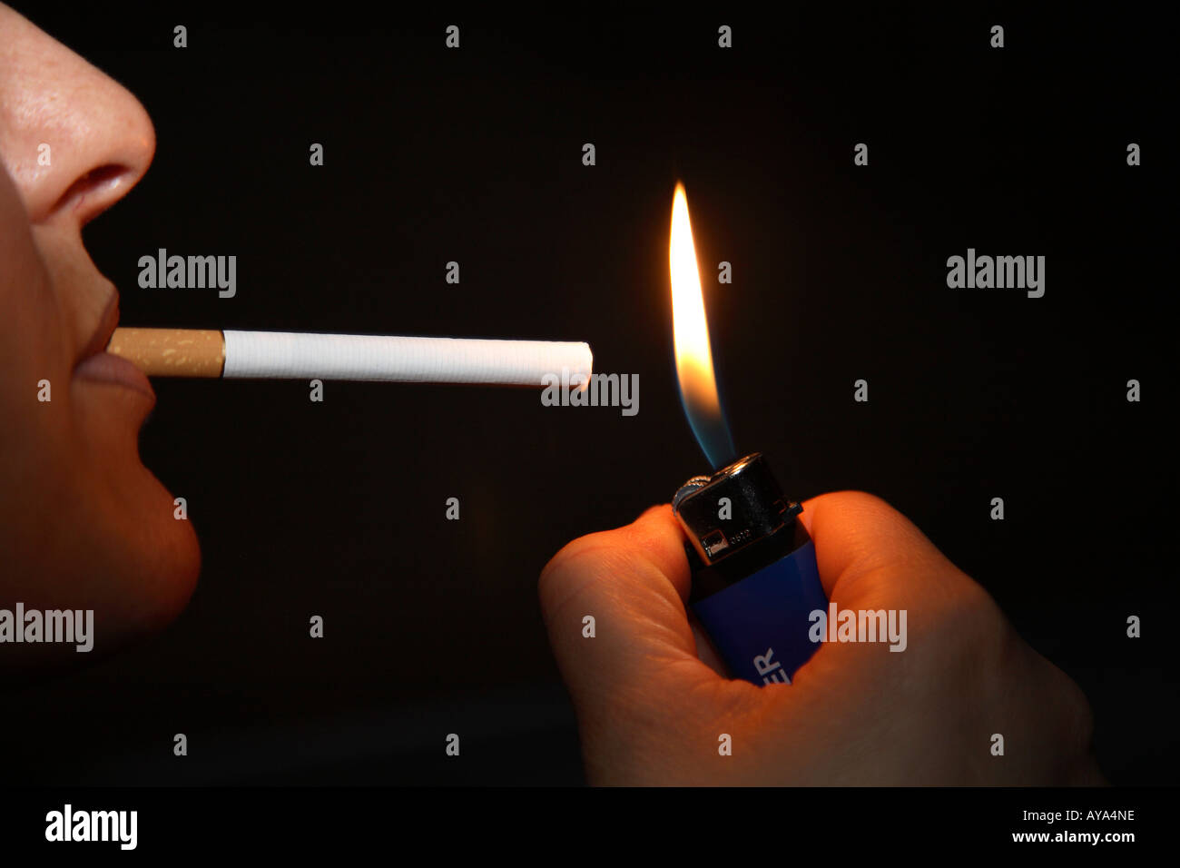Lighting a cigarette Stock Photo Alamy