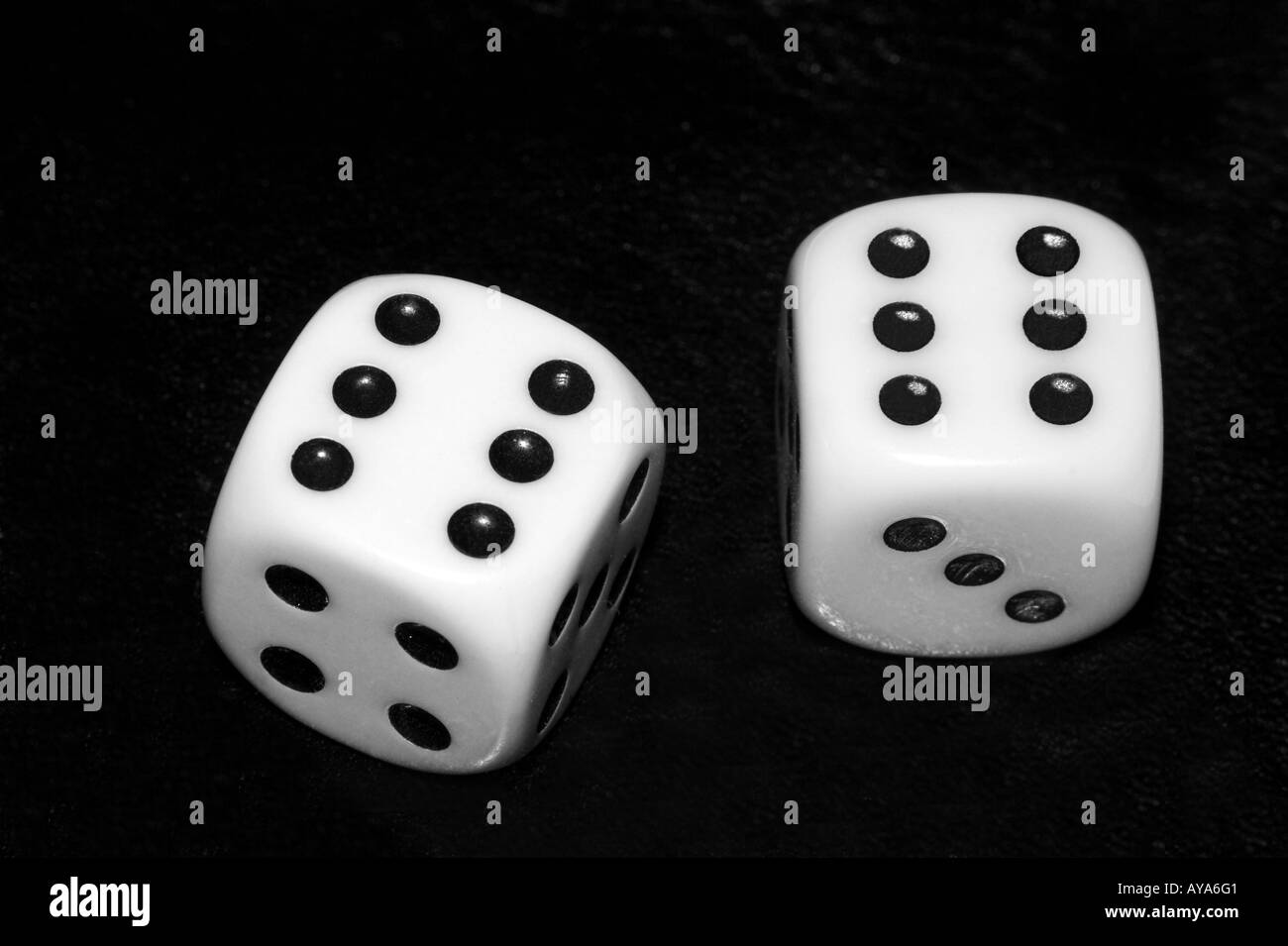 Two dice showing six dots, symbol for luck Stock Photo Alamy