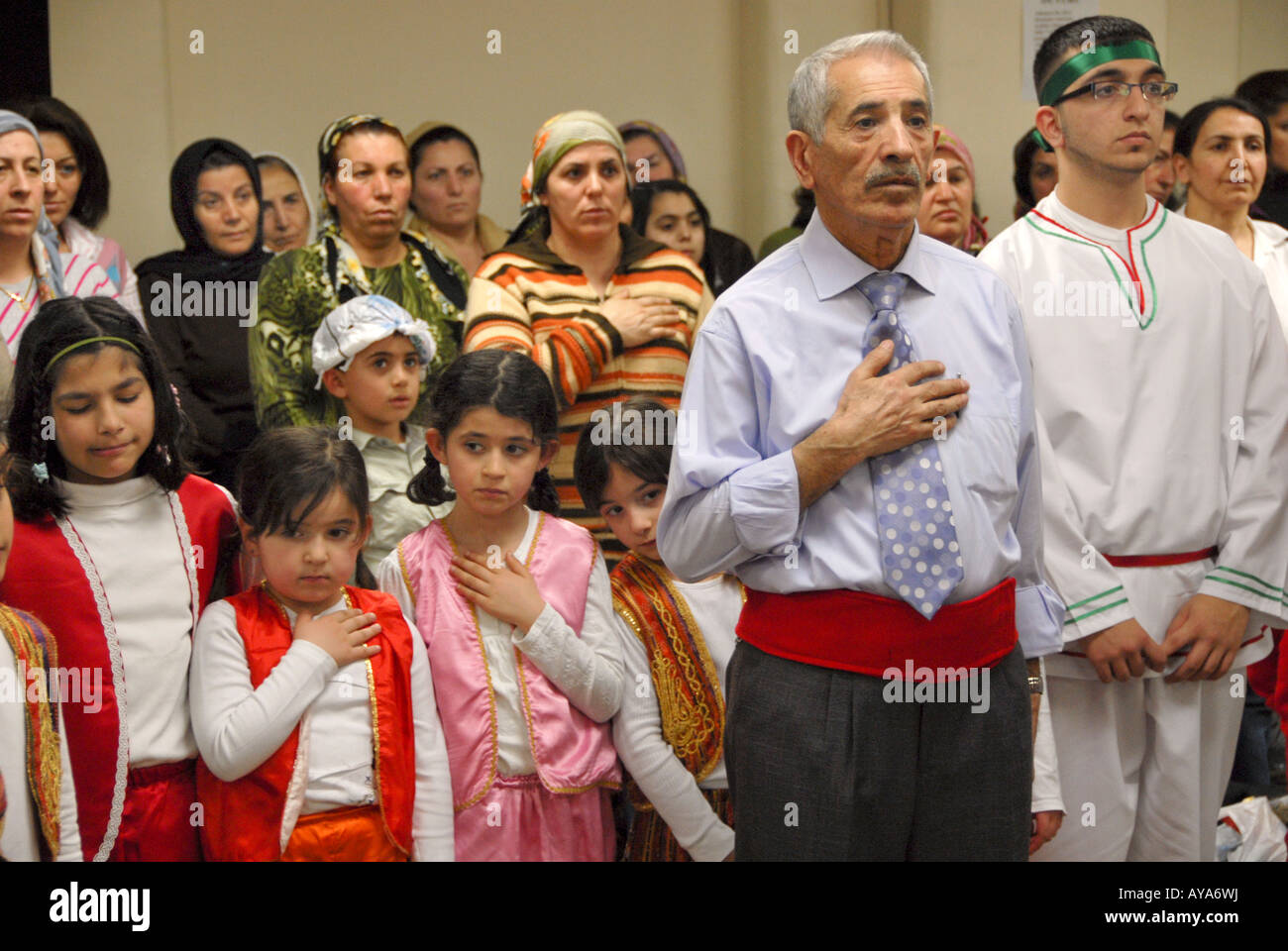 YOUNG AND OLD ETHNIC ALEVIS DURING THE 'SEMAH CEREMONY'IN NORTH LONDON ALEVI CULTURAL CENTER Stock Photo