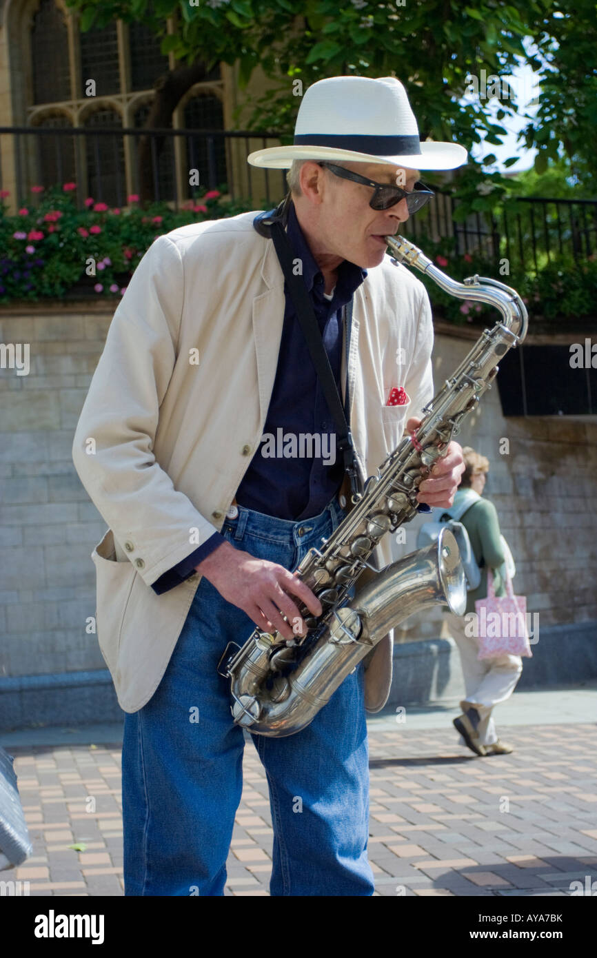 Saxophone player busking on the streets of Nottingham Stock Photo Alamy