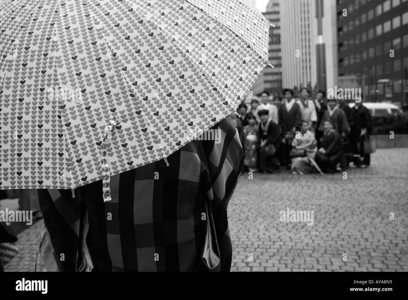 Asia Tokyo Japan Woman wearing traditional kimono holding umbrella