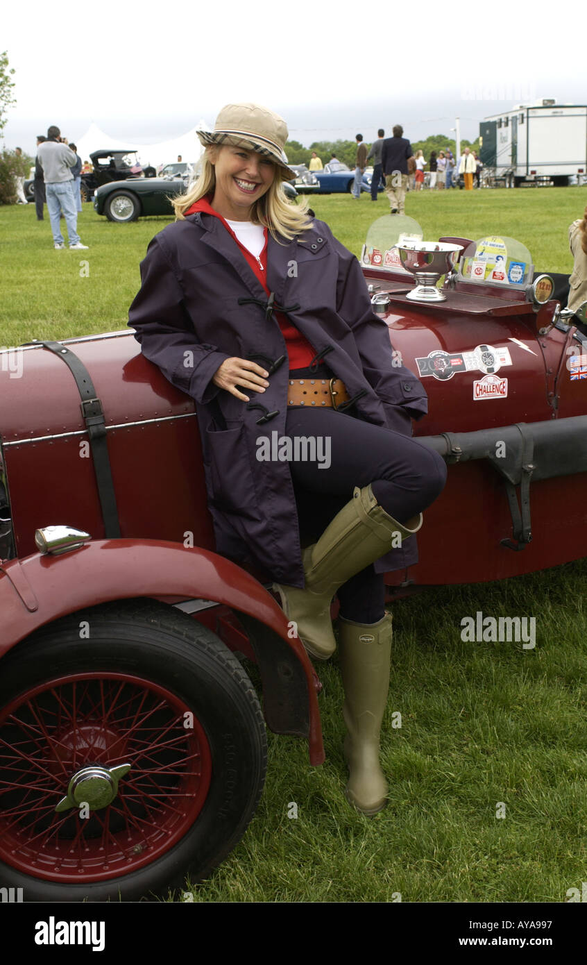 Bridgehampton NY 052602 Model Christie Brinkley poses with a car at the 2002 Hamptons Concours d