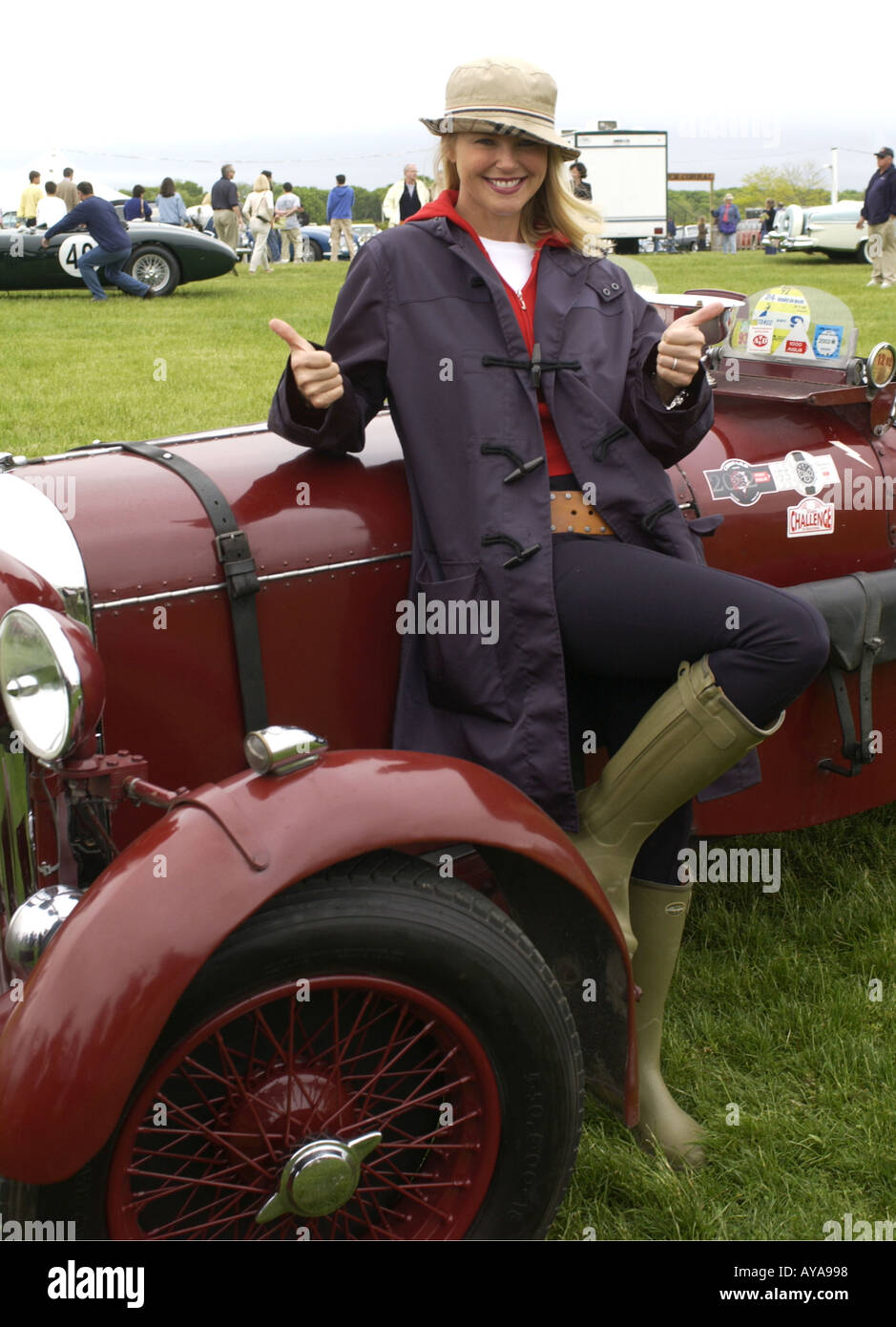 Bridgehampton NY 052602 Model Christie Brinkley poses with a car at the 2002 Hamptons Concours d