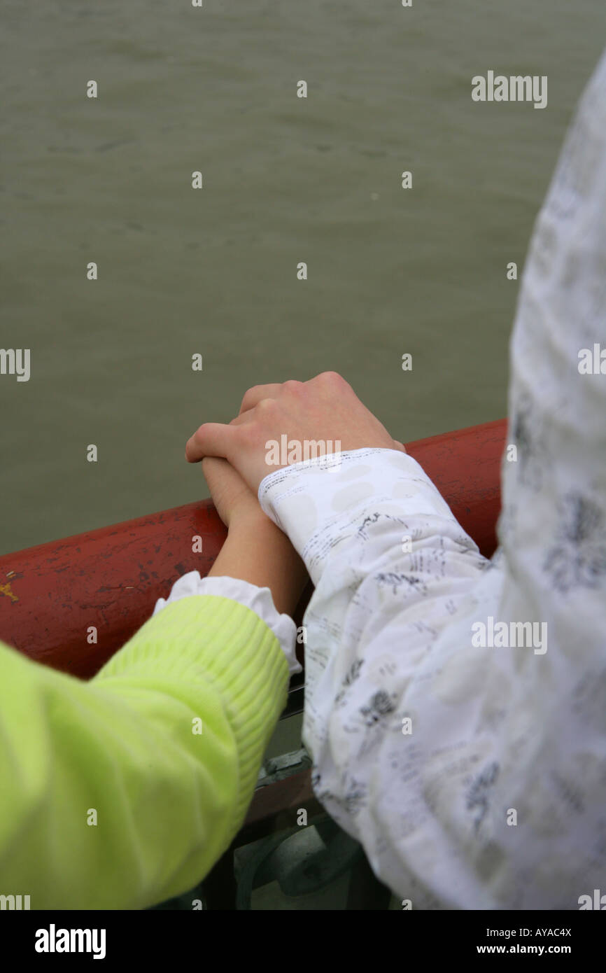 young couple holding hands at the Bund Stock Photo