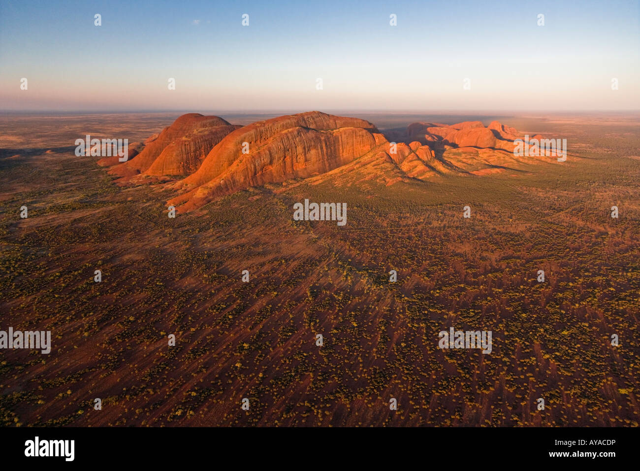 Aerial view of a glowing red Kata Tjuta (Olgas) at Sunset in Northern Territory of Australia Stock Photo