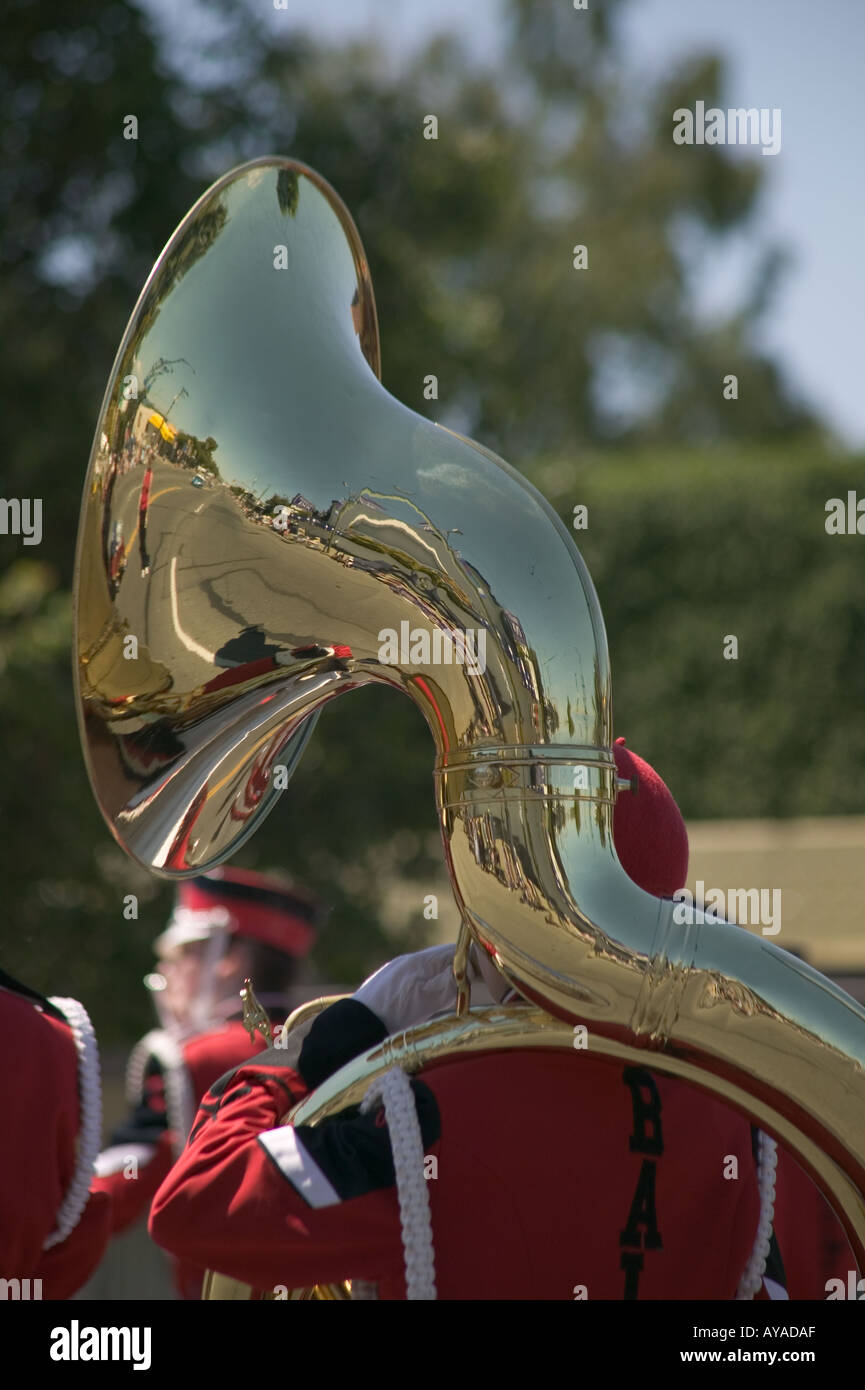 High school marching band member playing Sousaphone in parade Stock Photo