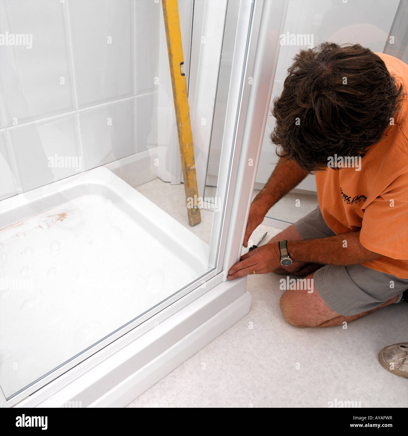 Fixing Shower Panels in New Bathroom Stock Photo Alamy