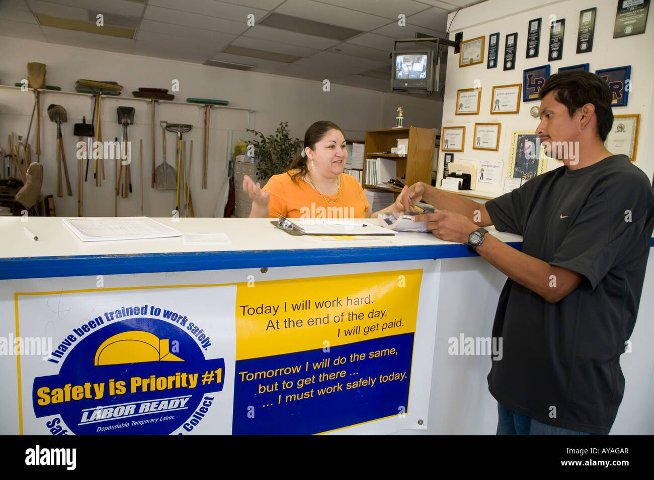 Phoenix Arizona A worker looks for a job at Labor Ready a temporary labor agency Stock Photo