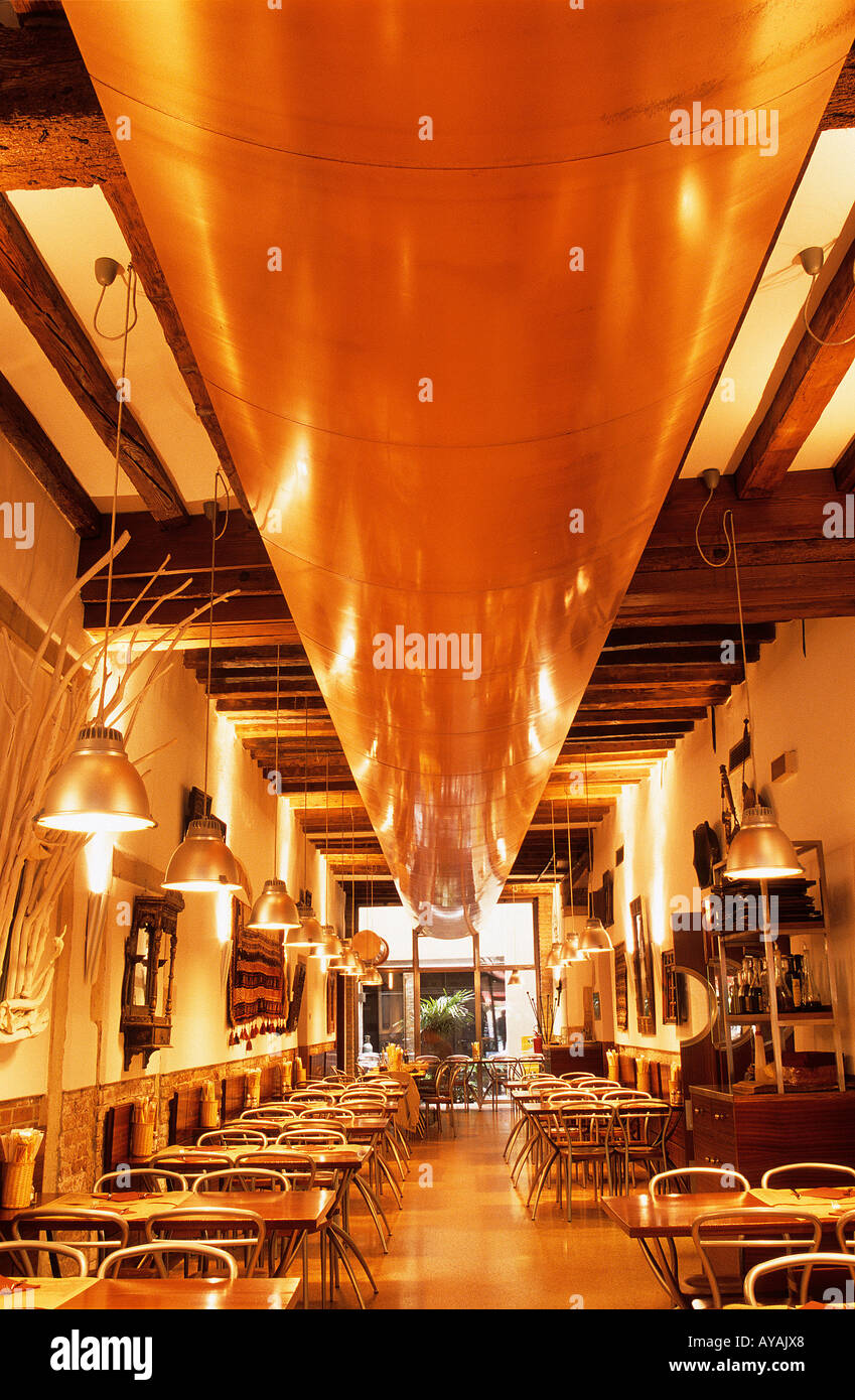 Antica Birraria well lit restaurant interior orange Stock Photo