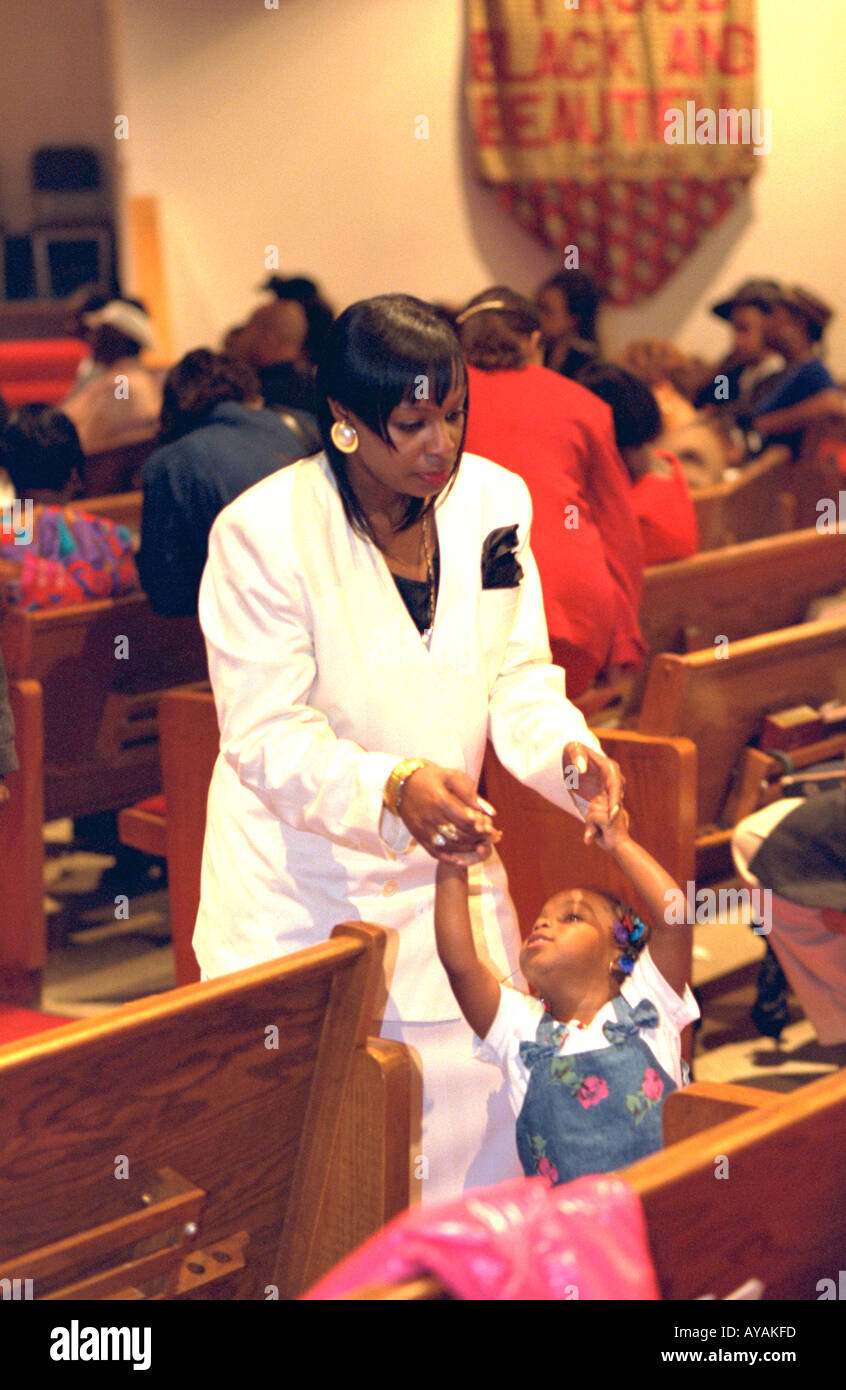 Mother and daughter age 36 and 3 at church service. Mount Olivet