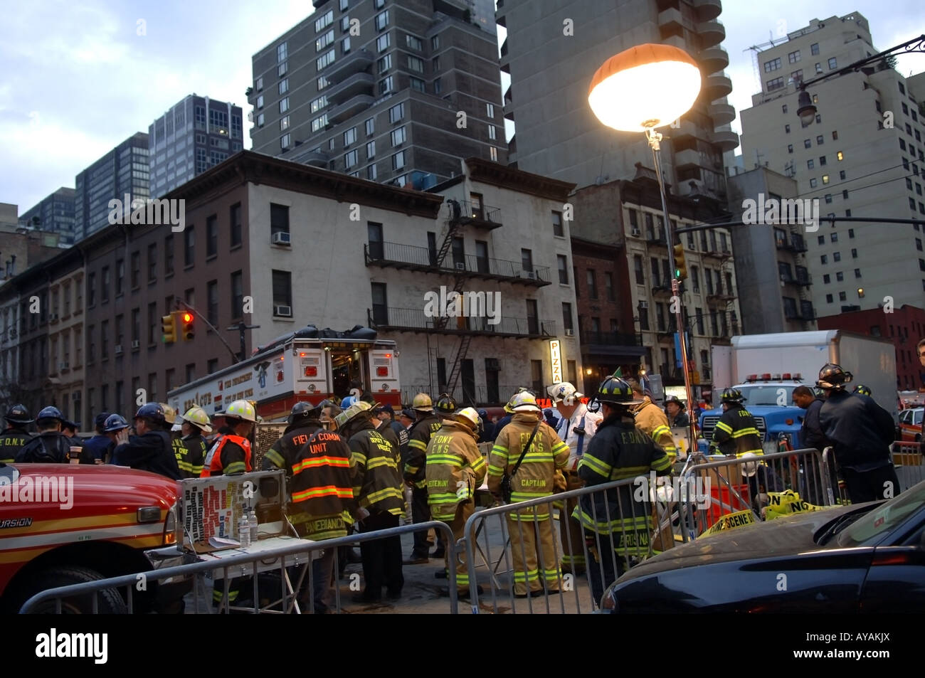 Emergency service personnel at a construction accident on East 51st St Stock Photo