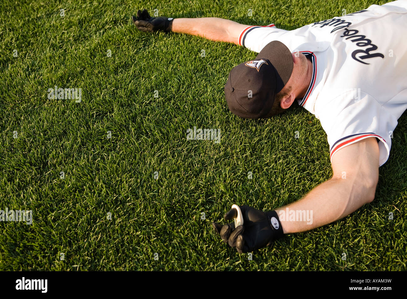 Baseball player stretching Stock Photo