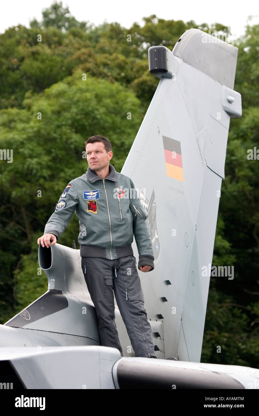 German airforce pilot standing beside tail of his Tornado aircraft Stock Photo