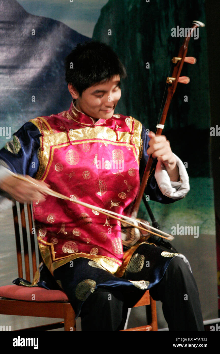Chinese Student On A Yangtze River Cruise Ship Playing A Classical 