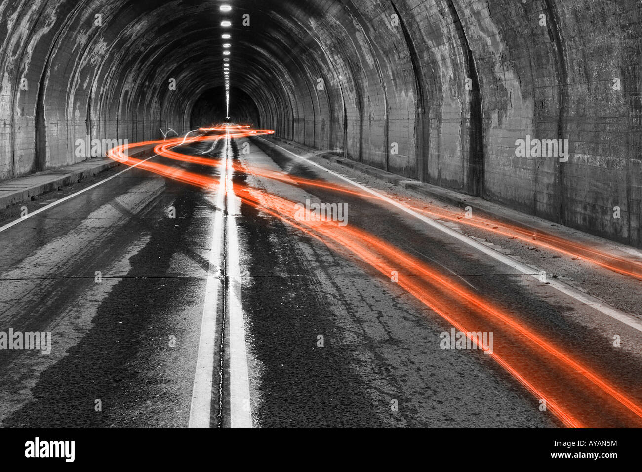 Car swerving in tunnel at night Stock Photo Alamy
