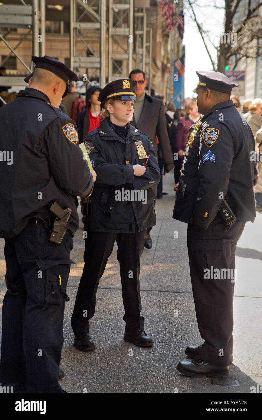 Police officers of both sexes at the Easter Parade on Fifth Avenue New York City Stock Photo