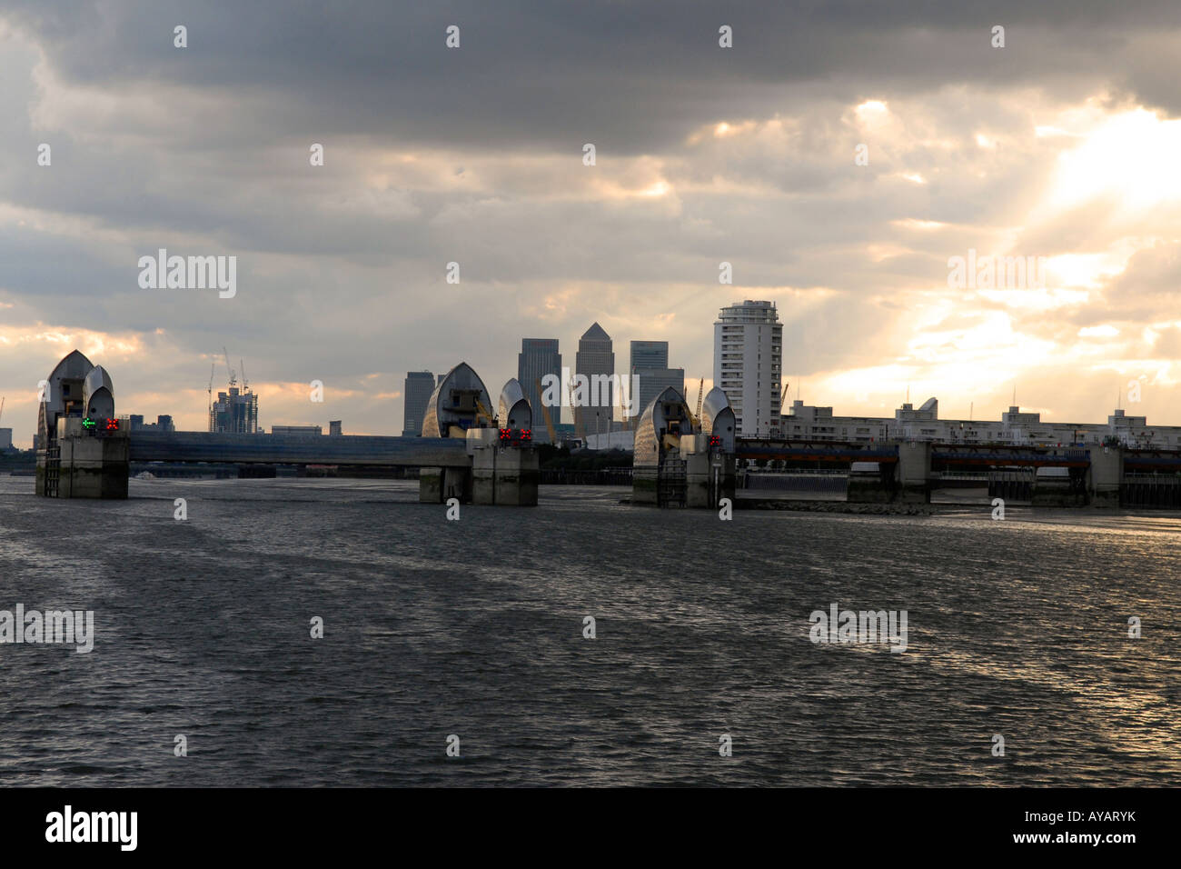 Study of The Thames Barrier landmark no III at dusk with storm clouds ...