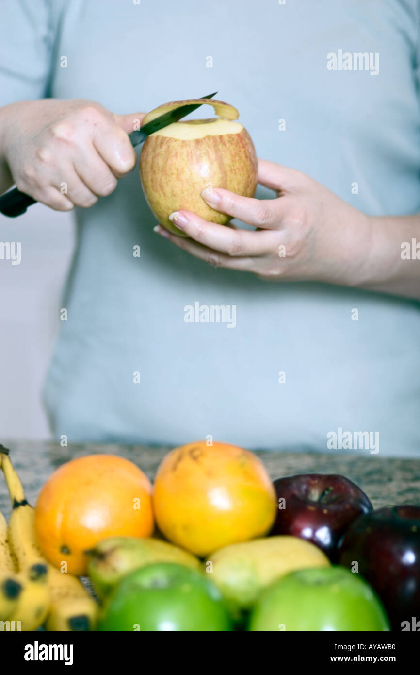 Hands peeling banana hi-res stock photography and images - Alamy