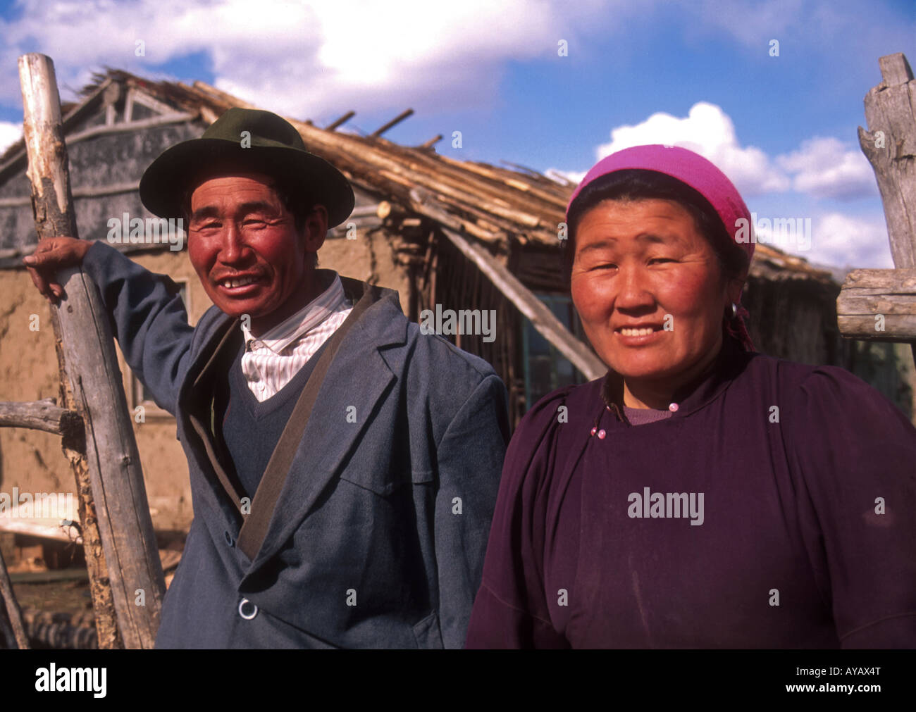 Mongolian farmer and wife at farmhouse on Hulun Buir Grasslands of Inner  Mongolia Stock Photo - Alamy