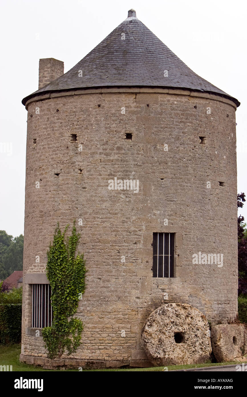 Old flour mill with grinding stones in Normandy France Stock Photo