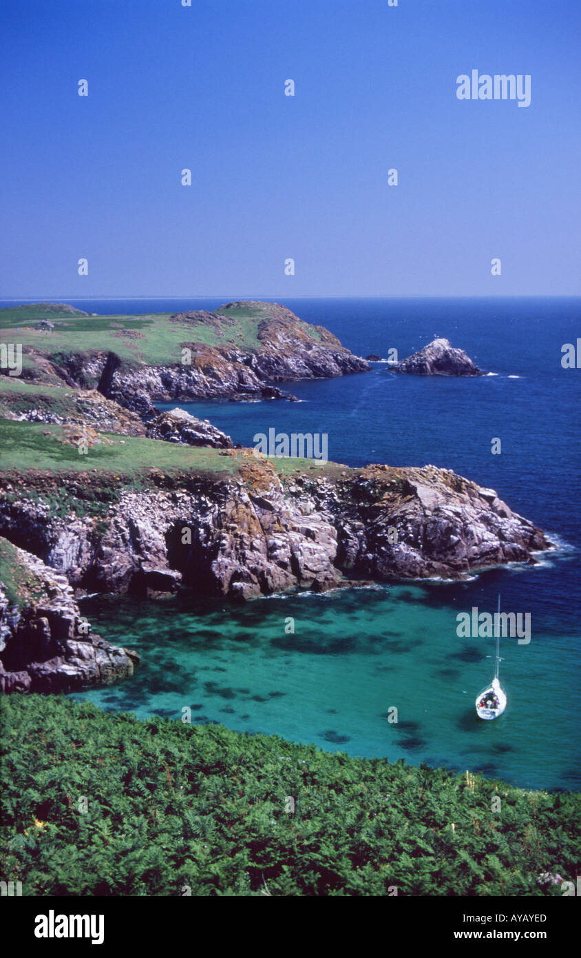 Summer yacht moored off the shore of Great Saltee Island. County Wexford, Ireland. Stock Photo