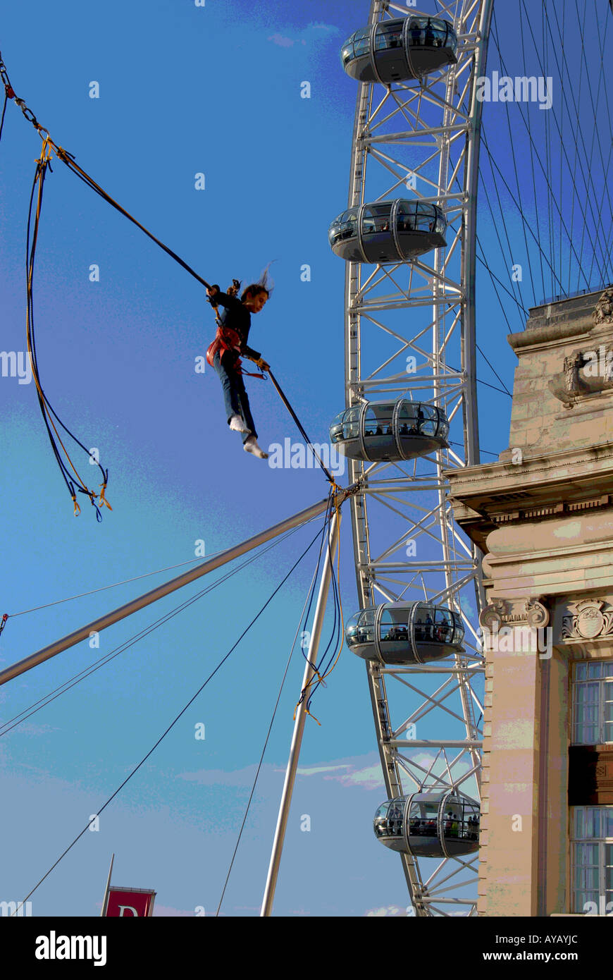The London Eye from a nearby bungee jumping children's playground Stock