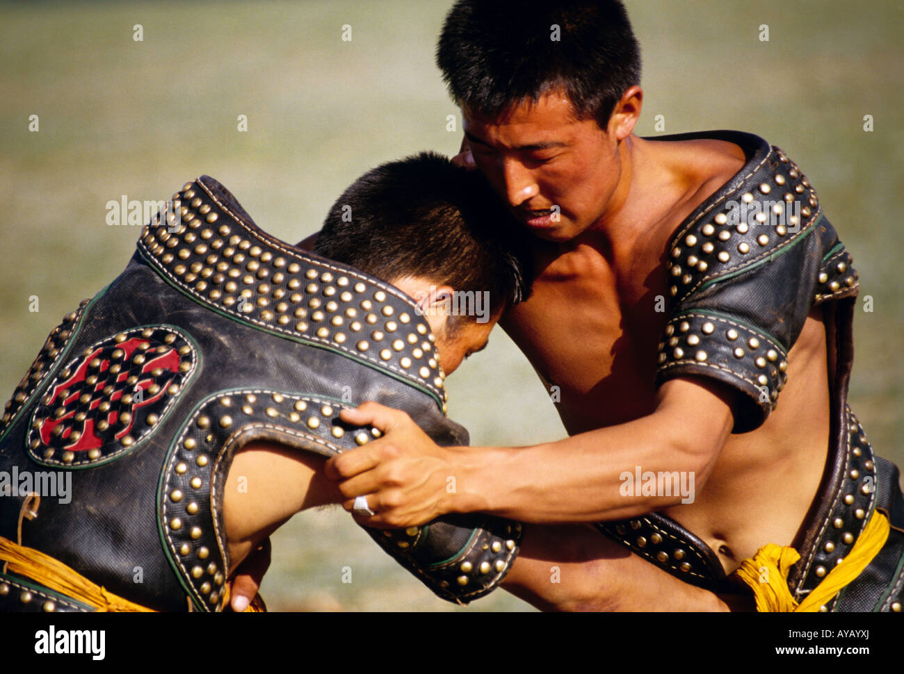 Young Mongolian wrestlers at Nadam Summer Festival on grasslands of Siziwang Banner near Hohhot in Inner Mongolia Stock Photo