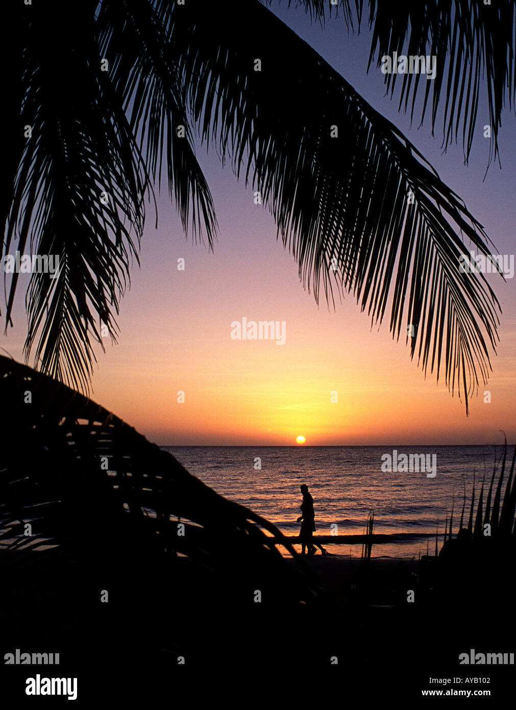 Negril Beach in Jamaica at sunset Stock Photo