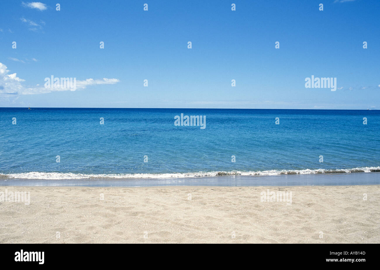 Clean beach calm sea 100 Visibility Stock Photo