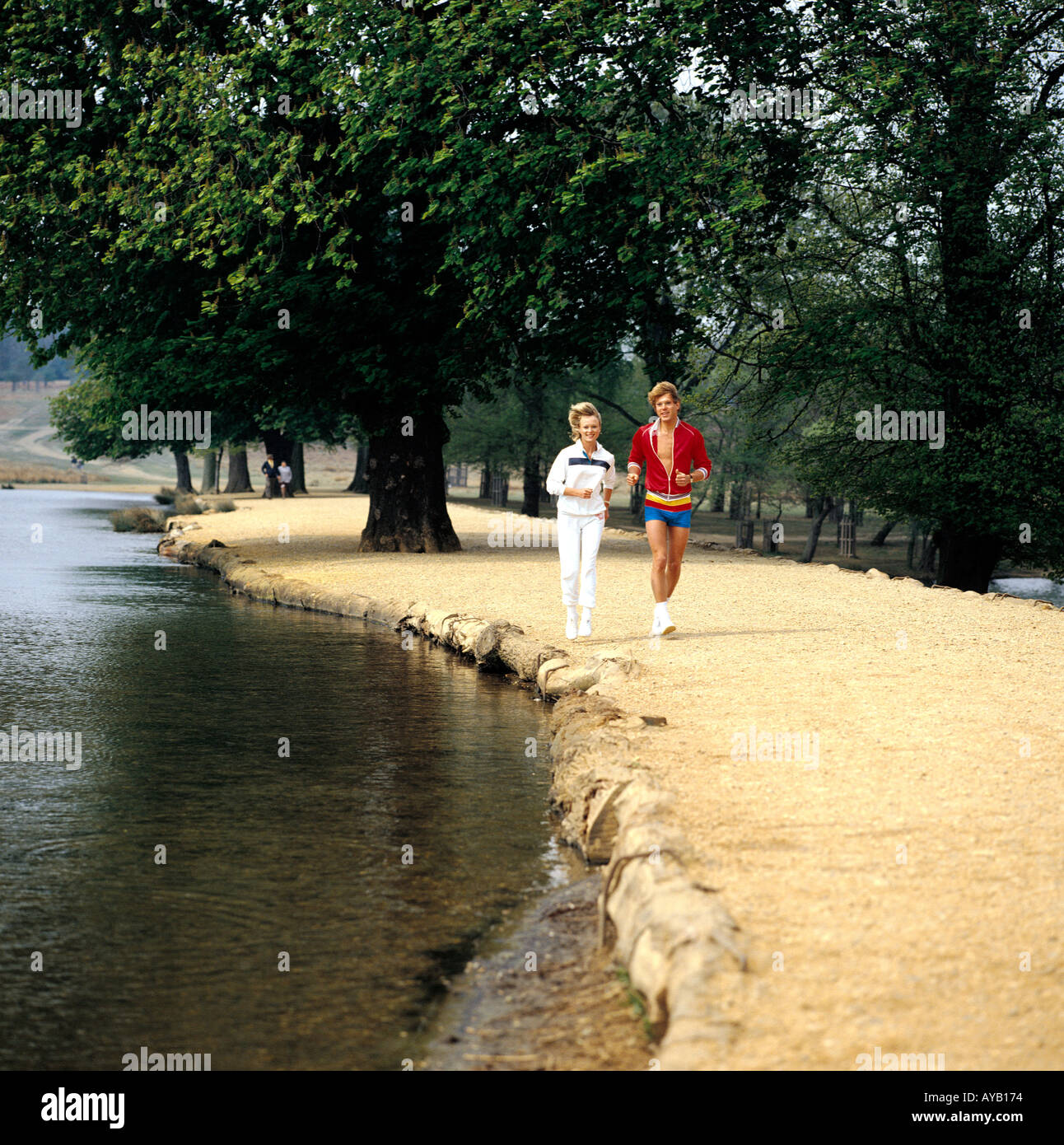 Young Couple Jogging Stock Photo